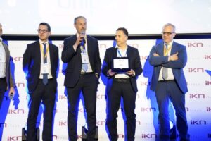 Unipol team accepting the Best Innovative Project award at the Italy Insurance Forum 2026 in Milan